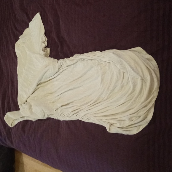 Asymmetrical cream coloured top. Large, gathered sides. - Picture 1 of 2